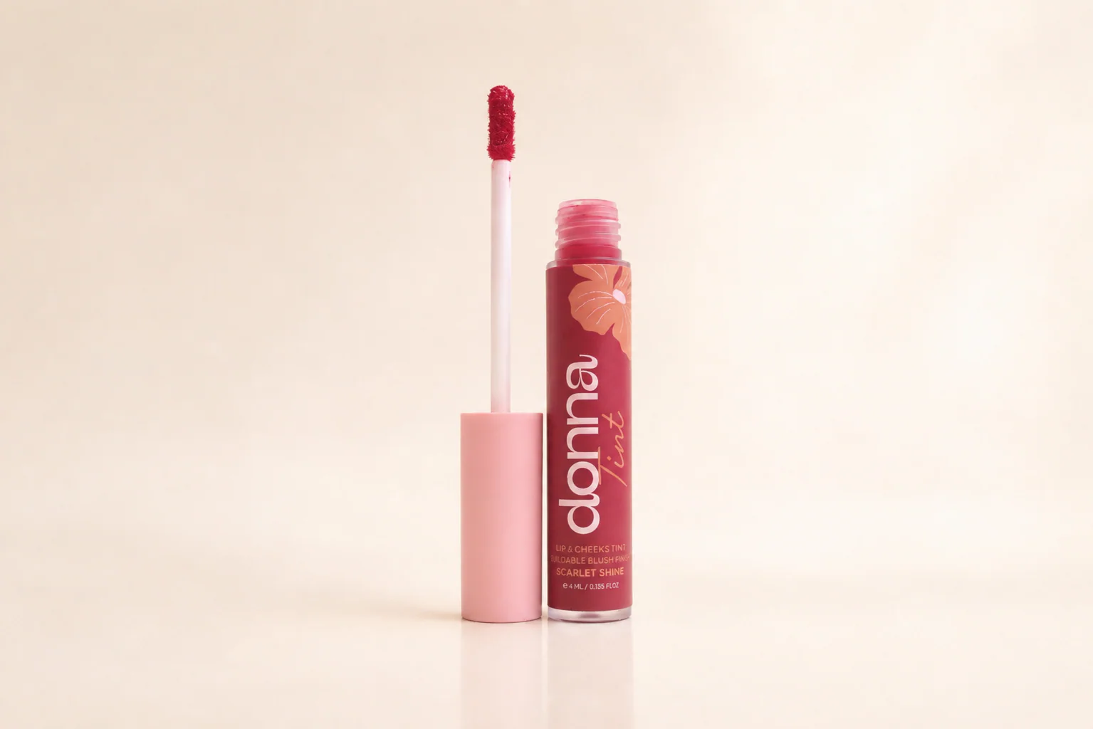 Open Donna Scarlet Shine tint with its applicator