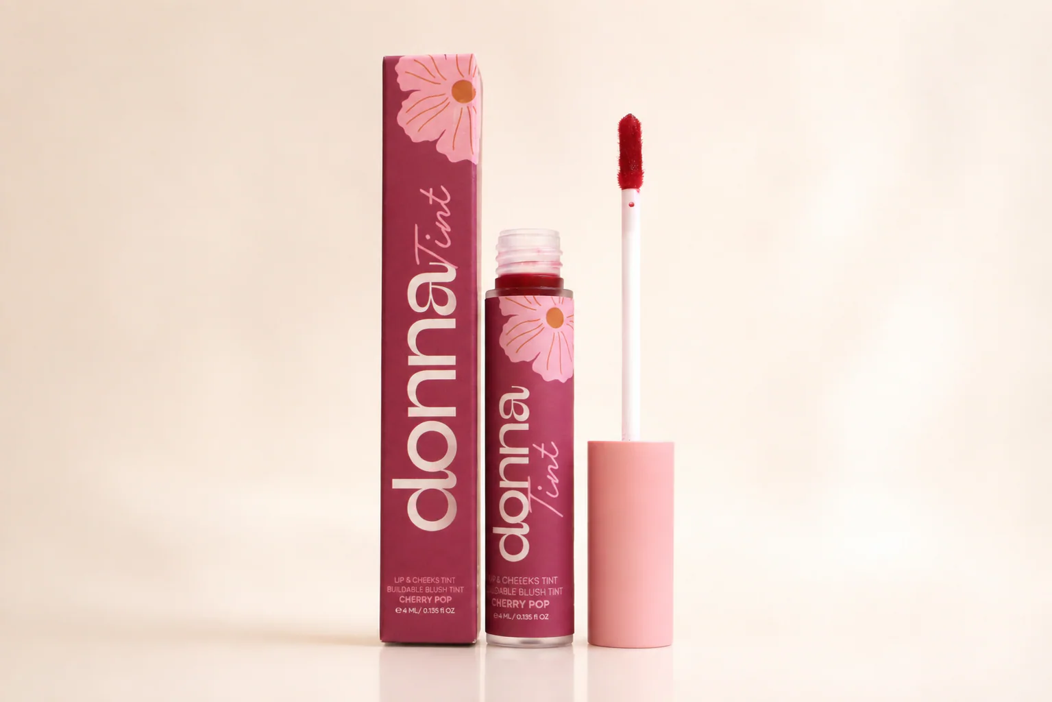 Open Cherry Pop tint, applicator, and carton
