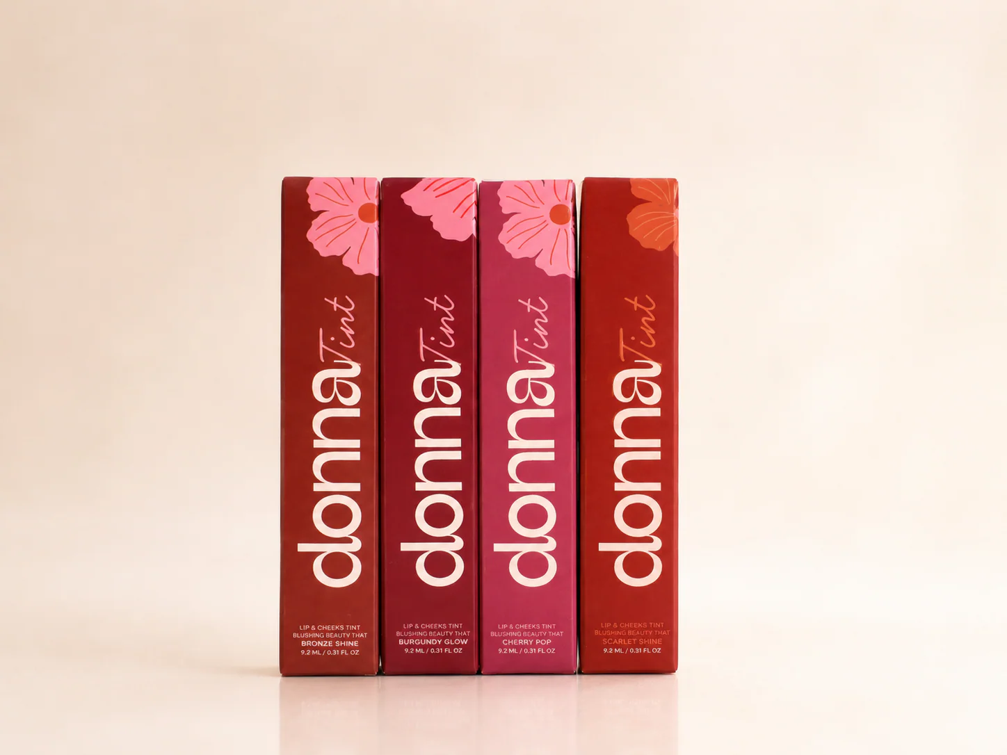 Four Donna Tint Wardrobe cartons standing together